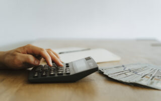 Person using black and gray laptop computer