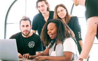 Woman sharing her presentation with her colleagues